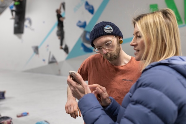 Climbers discussing a workout plan