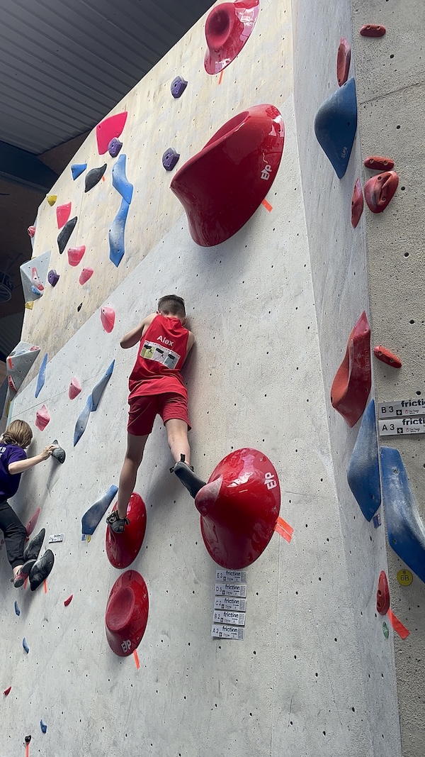 Judge recording scores at a climbing competition