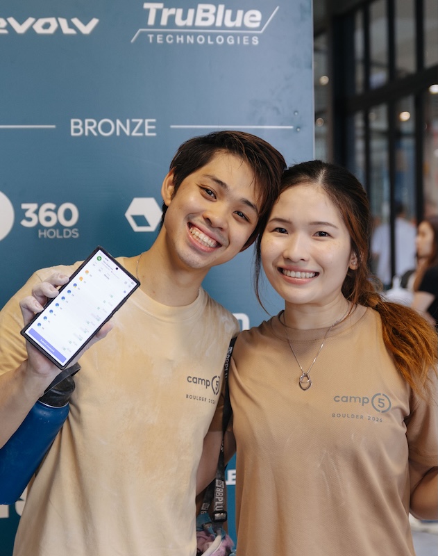 Climbers at a bouldering competition