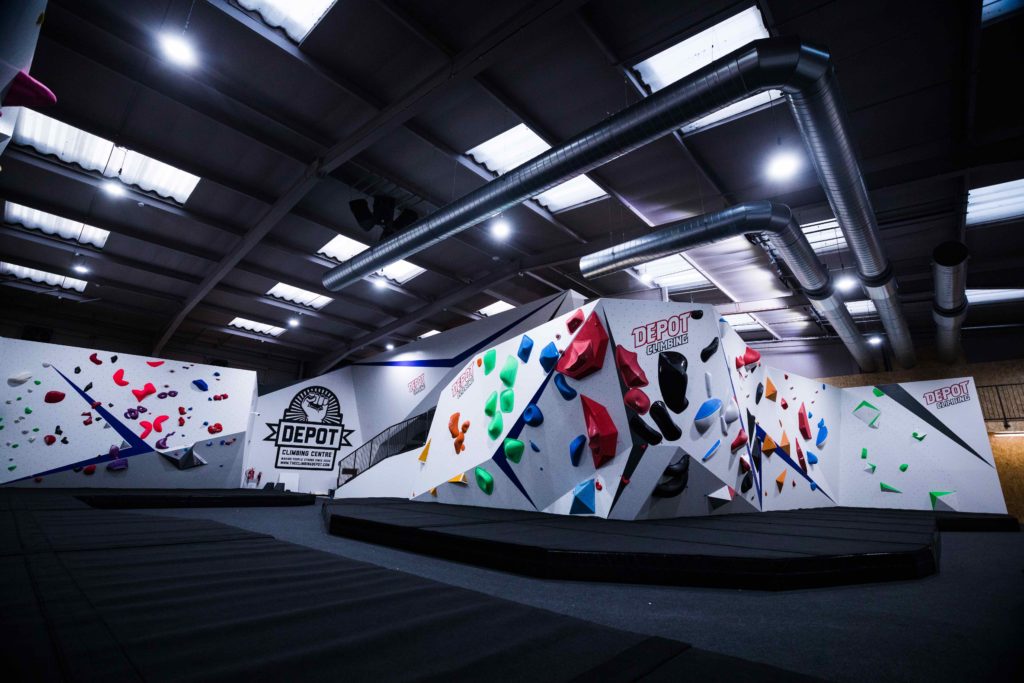 Large climbing gym with colourful holds