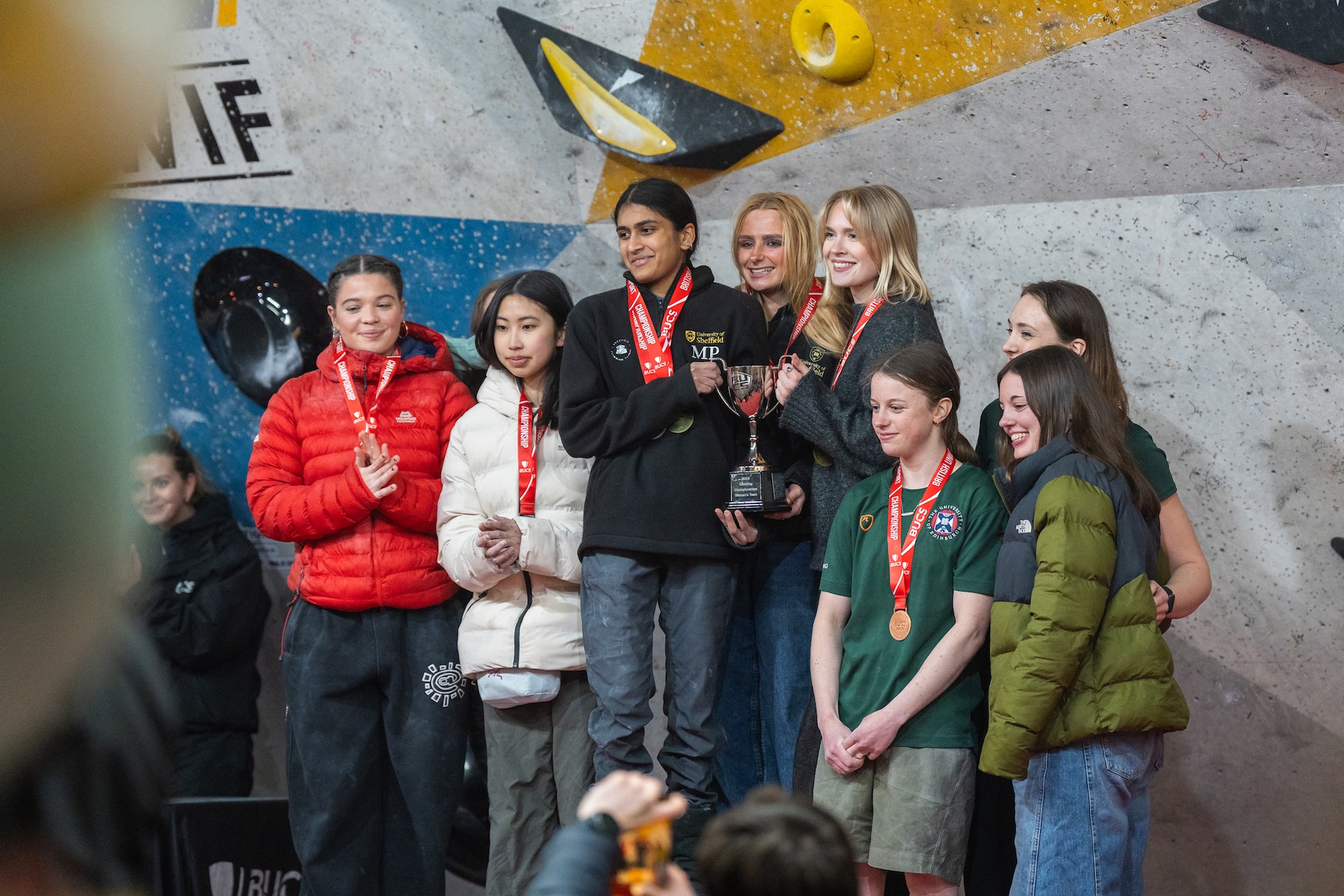 Climbers celebrating at a competition