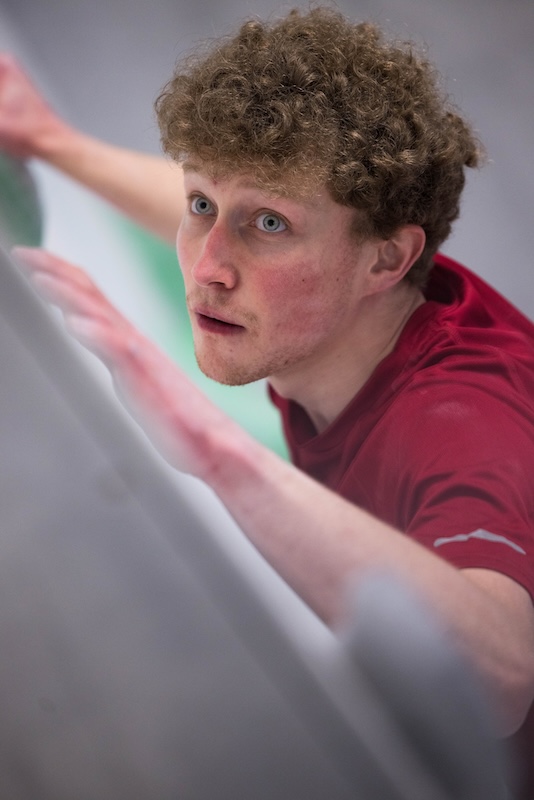 A climber on an indoor wall