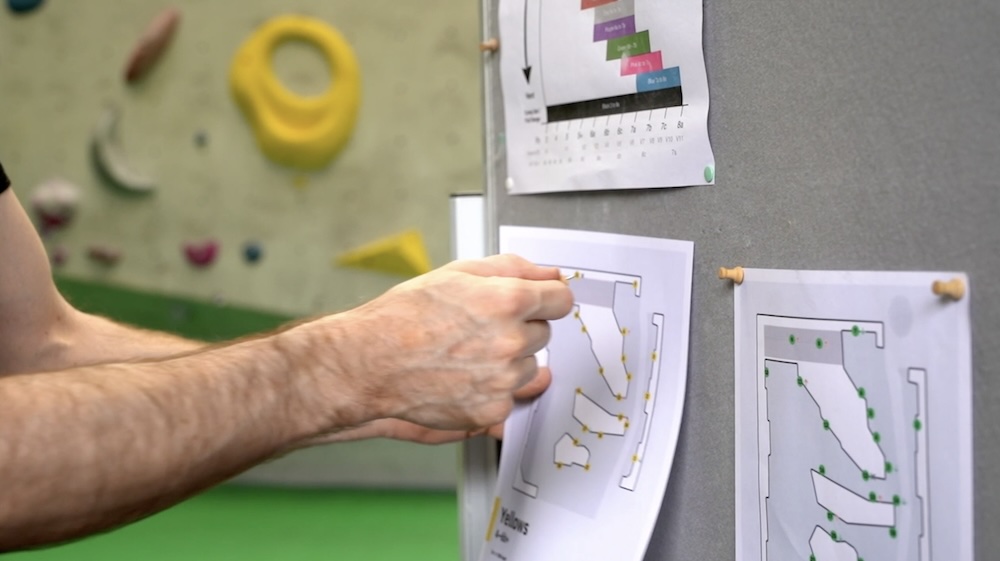 Printed route maps being reviewed